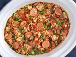 Jambalaya in a white crockpot.