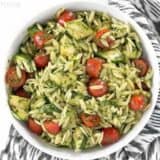 Zucchini and orzo salad with chimichurri in a bowl.