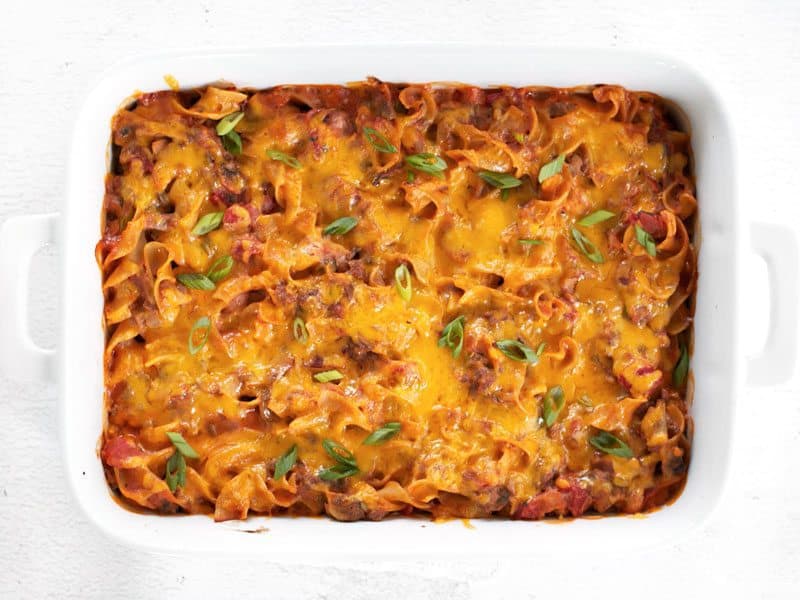 Beef & Mushroom Country Casserole is a filling and flavorful hot meal that the whole family will love, and with NO cream of soups! BudgetBytes.com Baked Beef & Mushroom Country Casserole in the casserole dish, garnished with sliced green onions