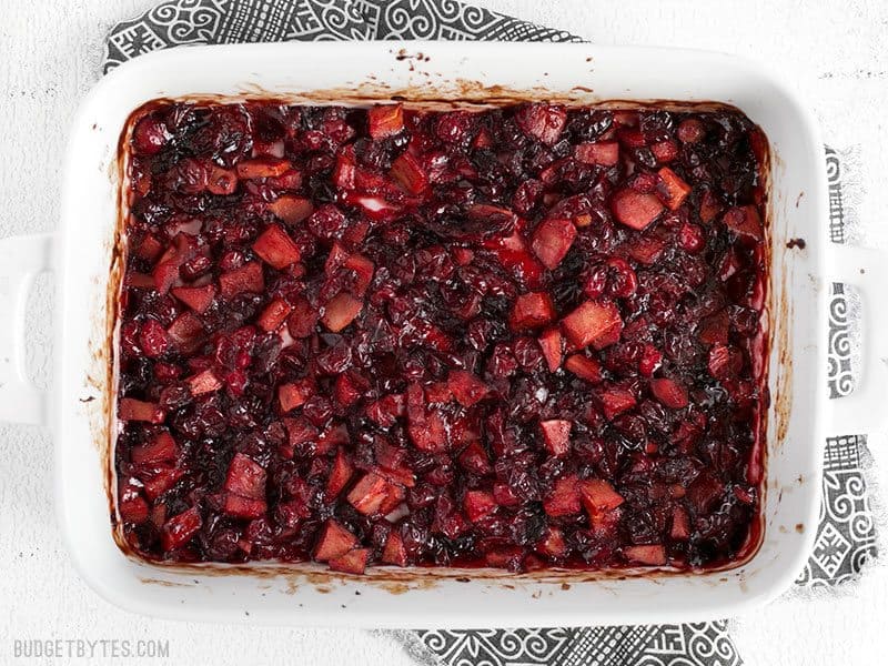 Roasted Apple Cranberry Relish is a thick, jam-like condiment whose uses go far beyond the Thanksgiving table. BudgetBytes.com Finished Roasted Apple Cranberry Relish in the casserole dish