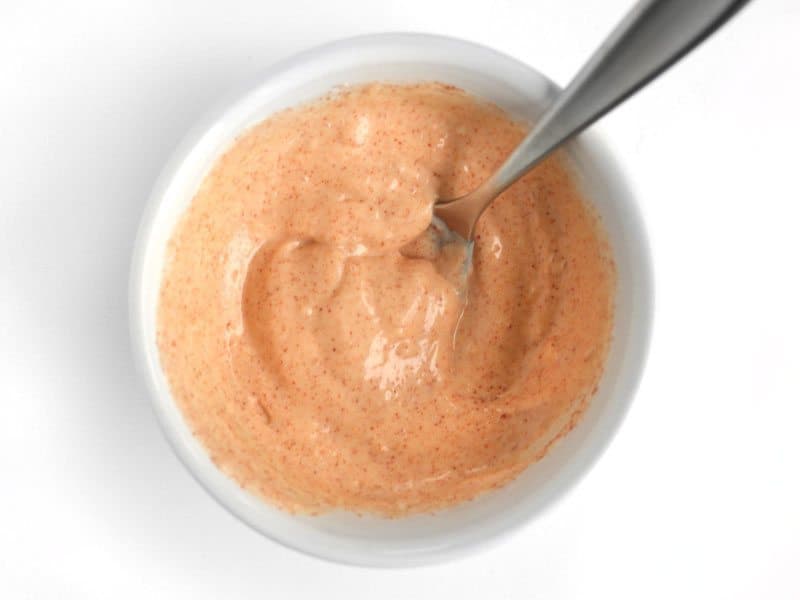 Top view of Smoky Garlic Mayo with spoon