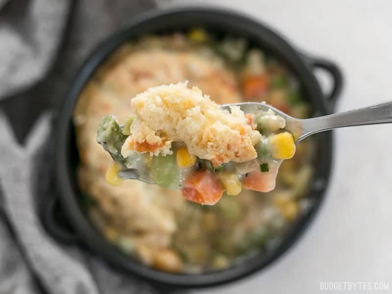 This rich and comforting Vegetable Pot Pie Skillet is made fast and easy for weeknight dinners thanks to frozen vegetables. Comfort food all in one skillet! Budgetbytes.com A forkful of warm and comforting Vegetable Pot Pie Skillet and Cheddar Biscuit