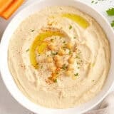 Overhead view of a bowl of homemade hummus.