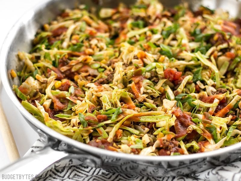 This Southwest Beef and Cabbage Stir Fry is a fast, easy, and flavorful way to make sure dinner is filled with plenty of vegetables. BudgetBytes.com Southwest Beef and Cabbage Stir Fry in the skillet, viewed from the side