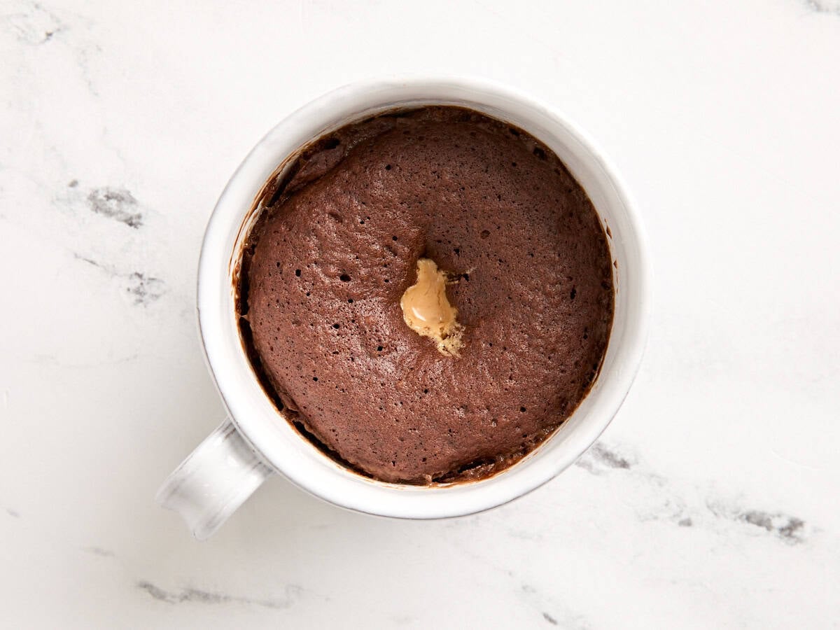 Overhead view of a finished chocolate mug cake.