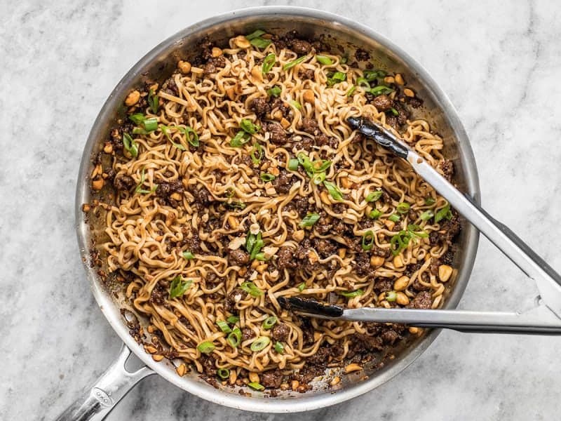 Sweet, salty, rich, and crunchy, these Pork and Peanut Dragon Noodles hit all the bases. It’s fast, easy comfort food for busy nights! BudgetBytes.com Pork and Peanut Dragon Noodles Finished