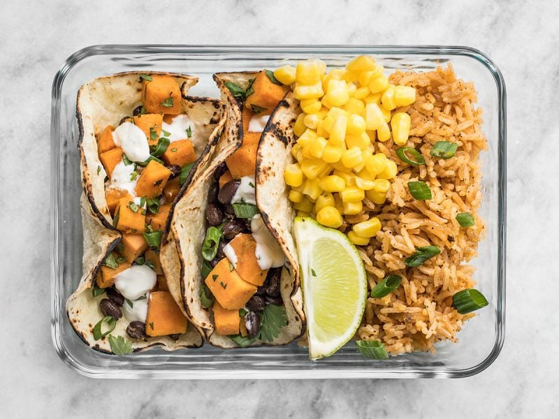 This simple Sweet Potato Taco Meal Prep box is easy, vegetarian, and a full flavored make ahead lunch. BudgetBytes.com One single Sweet Potato Taco Meal Prep container with lime
