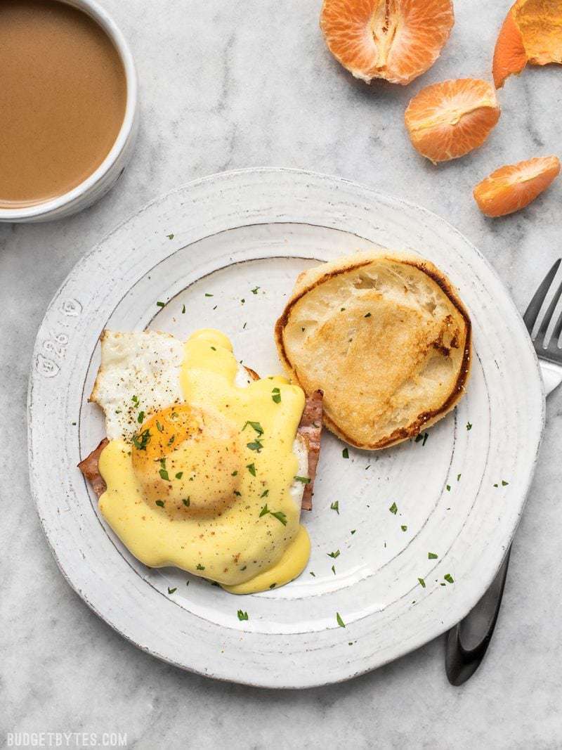 Almost Eggs Benedict is the easy and approachable version of the brunch classic, scaled back and scaled down to feed just two on a lazy weekend morning. BudgetBytes.com One serving of Almost Eggs Benedict with a cup of coffee next to it
