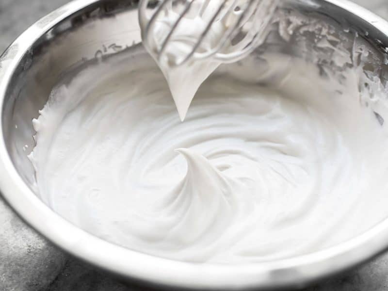 Medium peak in a bowl of homemade whipped cream