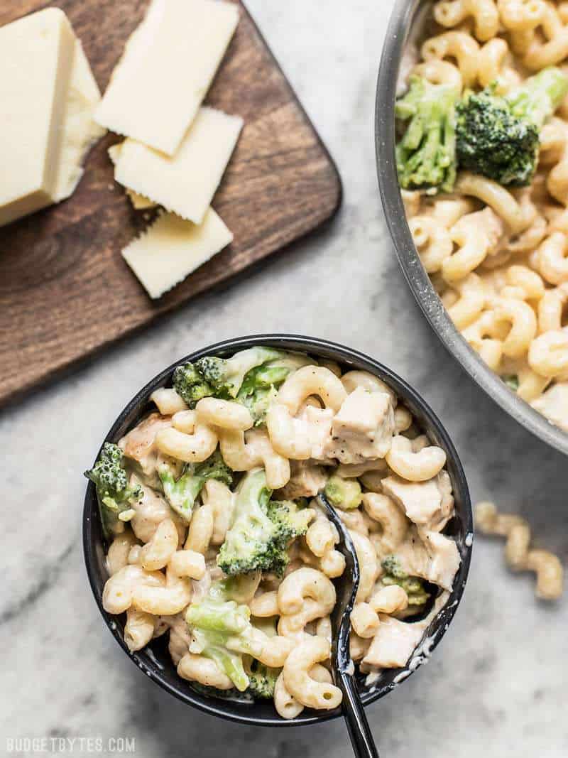 Simple, delicious, and totally comforting, this White Cheddar Mac and Cheese is the perfect quick fix for weeknight dinners. Budgetbytes.com A small bowl of White Cheddar Mac and Cheese next to the skillet and sliced white cheddar