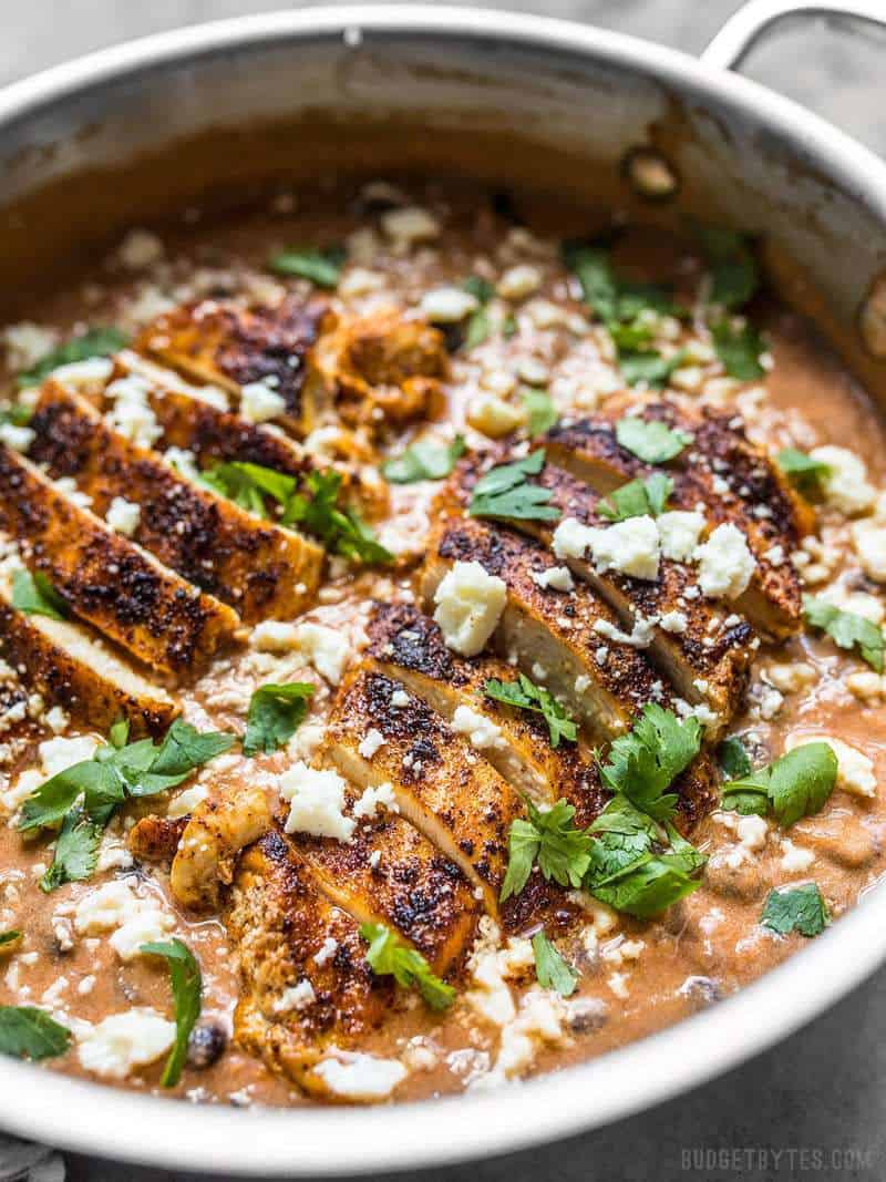 A simple jar of salsa is the key to making this fast and easy weeknight dinner. Just try this Creamy Salsa Chicken Skillet and see for yourself. Side view of creamy salsa chicken skillet