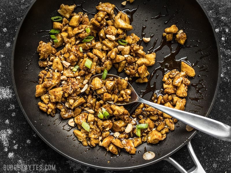 Skip the meat and make these light and fresh Hoisin Tofu Lettuce Cups, for a fast and easy weeknight dinner. Budgetbytes.com Hoisin Tofu mixture in the skillet with sauce and a spoon