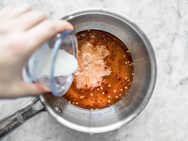 Adding Cornstarch Slurry.