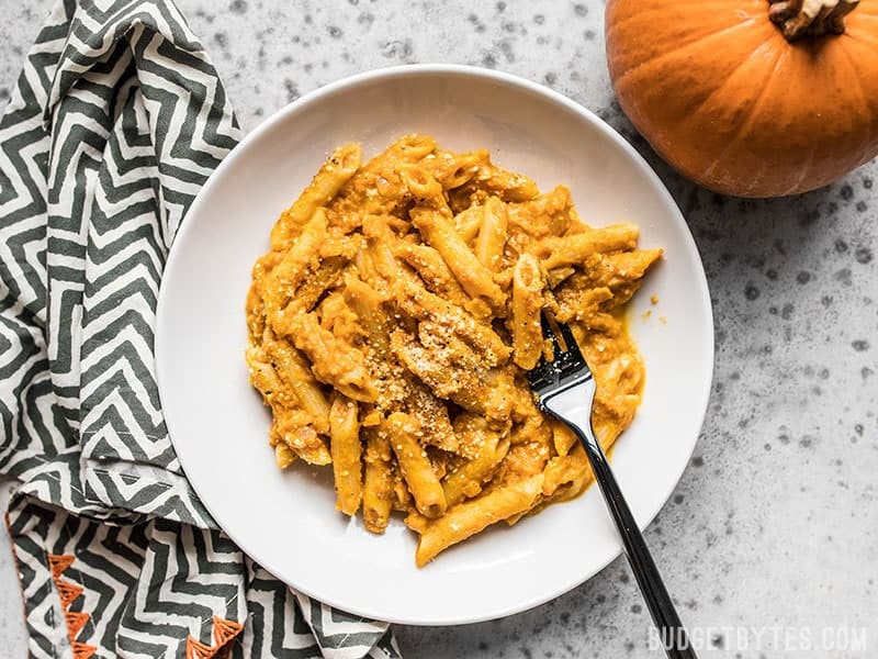 This easy tomato-free Chipotle Pumpkin Pasta is smoky, spicy, creamy, and the perfect way to celebrate fall flavors. Budgetbytes.com A bowl full of smoky, spicy, and creamy Chipotle Pumpkin Pasta.