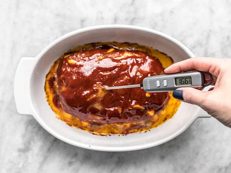 Confirming the Cheddar Cheeseburger Meatloaf is cooked properly.