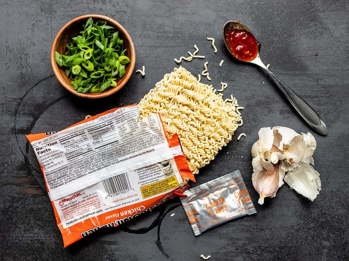 When all you have (or want) is one of those little cheap packets of noodles, here are 6 easy ways to upgrade instant ramen and make it a legit meal. BudgetBytes.com Several ingredients used to make the upgraded instant ramen like chili sauce, uncooked noodles, and green onion.