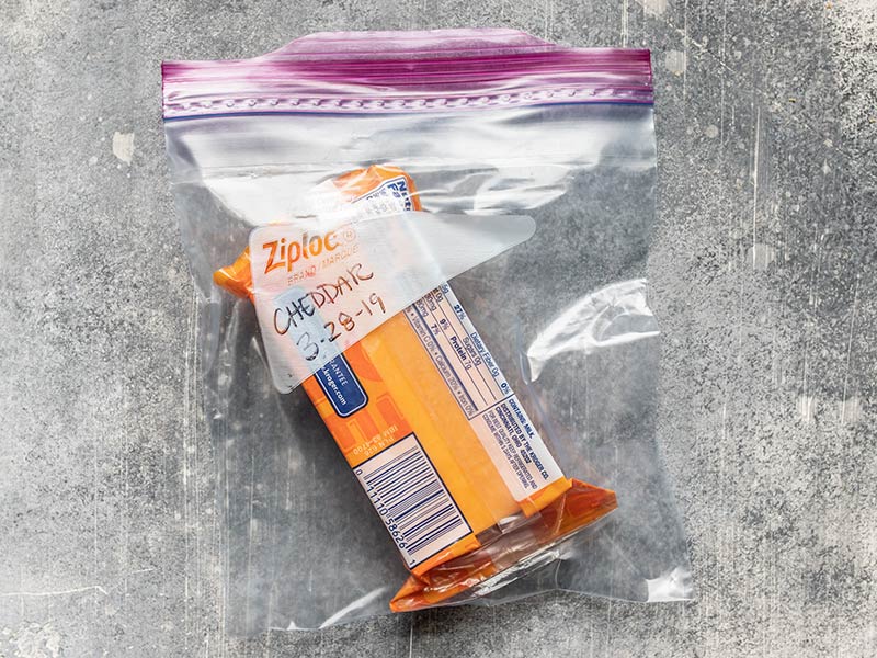 Reducing waste is critical to keeping a food budget. Here are 10 foods I freeze on a regular basis to save money and reduce waste in my kitchen. Budgetbytes.com Cheddar Cheese in a Freezer Bag