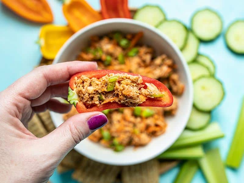 This Sweet and Spicy Tuna Salad is bold and flavorful, and has no mayonnaise! It's the perfect quick fix for summer months or your weekly meal prep. BudgetBytes.com A mini sweet pepper filled with sweet and spicy tuna salad