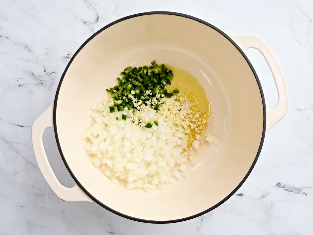 Diced onions, jalapeno, and minced garlic in a soup pot.