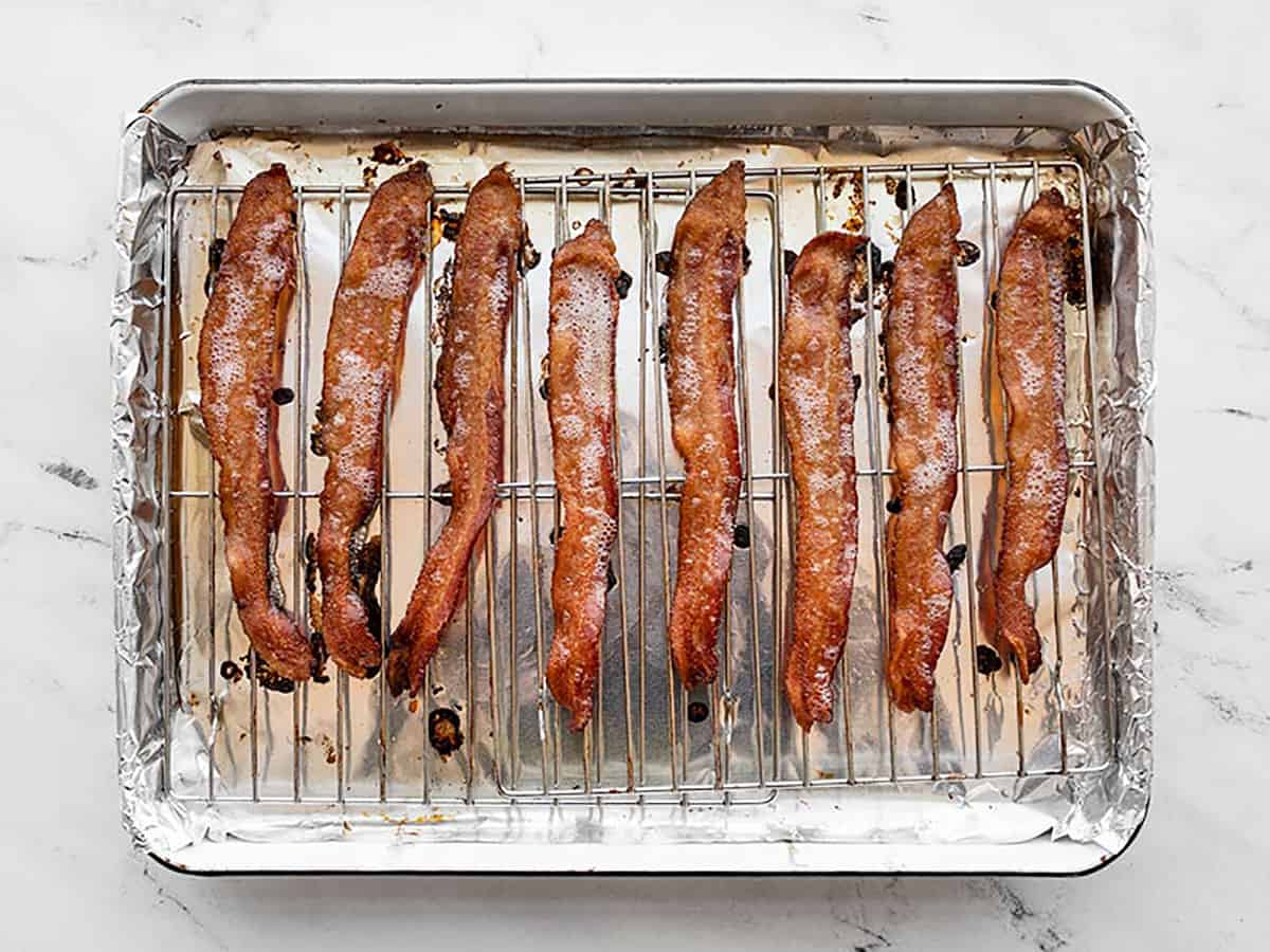 Fully baked bacon on the baking sheet.