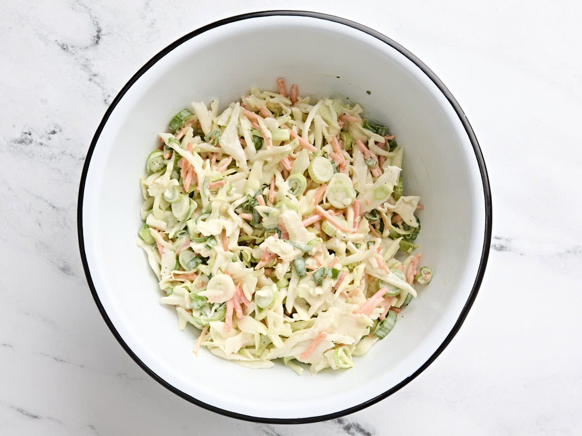 Finished homemade coleslaw in a bowl.