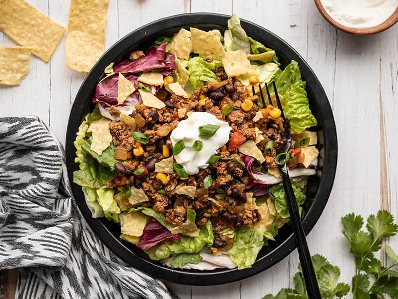 This easy and versatile Turkey Taco Skillet takes about 20 minutes to make, is freezer friendly, and can be served several different ways. BudgetBytes.com Turkey taco skillet used to make a taco salad