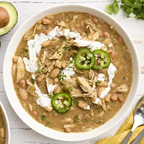 Overhead view of a bowl of slow cooked white chicken chili.