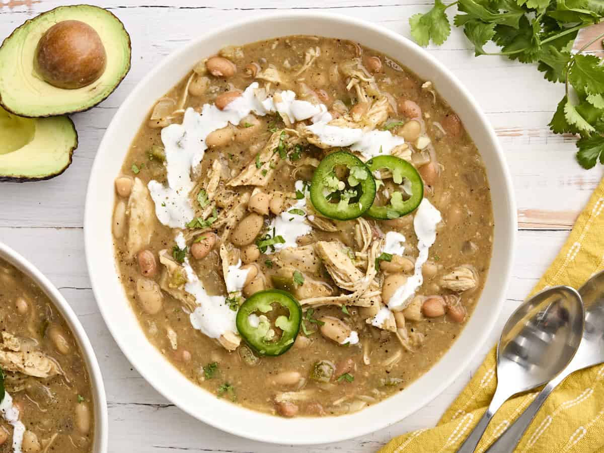 Overhead view of a bowl of slow cooked white chicken chili.