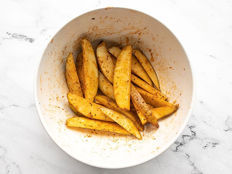 Seasoned potato wedges