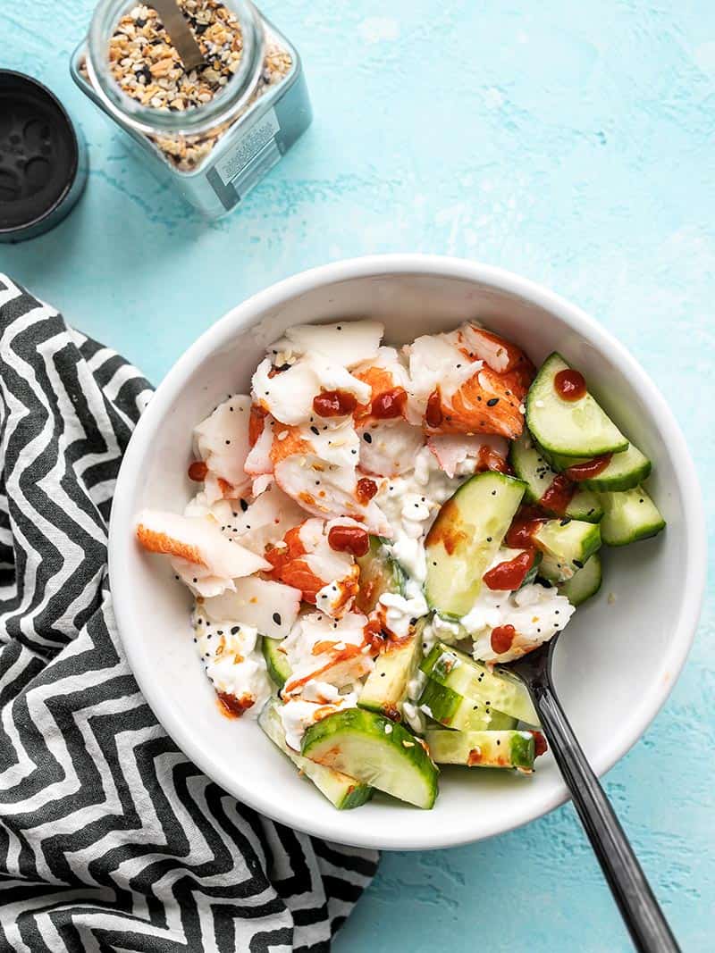 https://metabolic-life.news/wp-content/uploads/2020/05/Cottage-Cheese-Crab-Bowls-PIN2.jpg Finished Cottage Cheese Crab Bowl with a black fork in the side