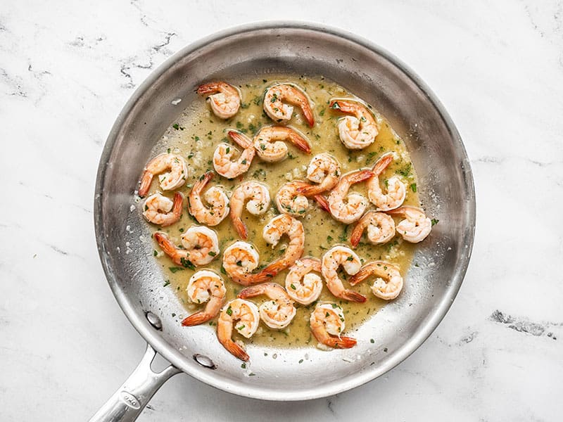 This super quick Garlic Butter Shrimp is a great à la carte protein that can be added to just about any meal! Budgetbytes.com Finished Garlic Butter Shrimp in the skillet
