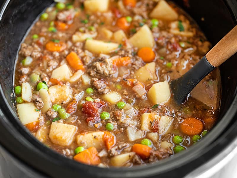 This super easy Slow Cooker Hamburger Stew is simple, comforting food at its best. And the leftovers are even better the next day! Budgetbytes.com Front view of Hamburger Stew in the slow cooker