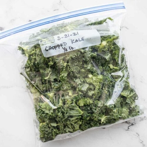 kale in a freezer bag that is labeled and dated