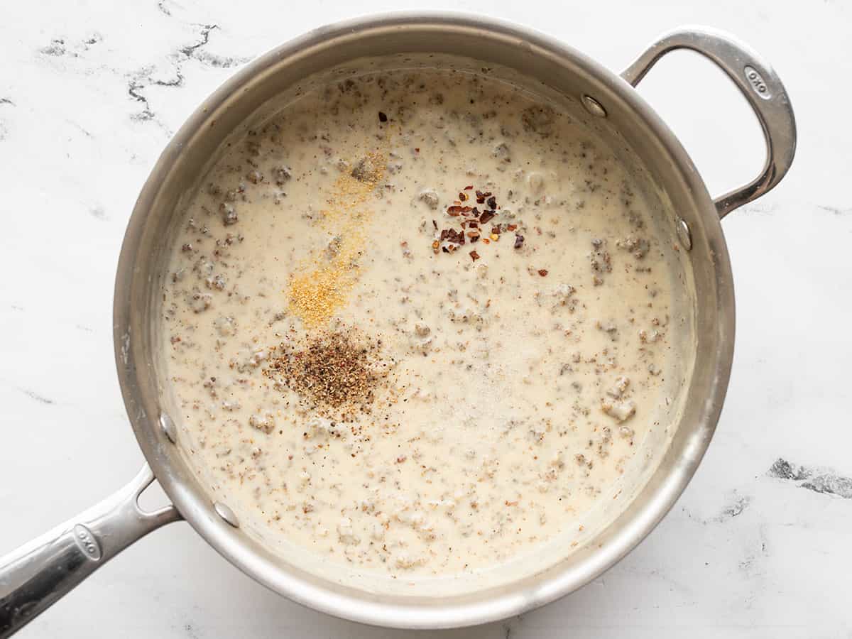 Seasonings added to gravy in the skillet