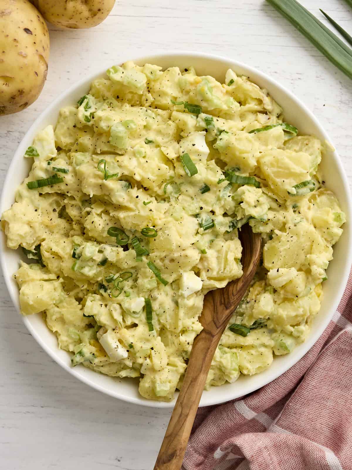 Overhead view of a bowl of homemade Southern style potato salad.