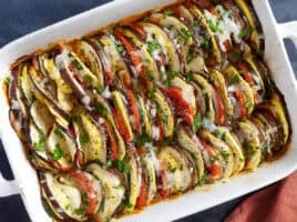 Overhead view of a baking dish filled with layers of oven roasted ratatouille.