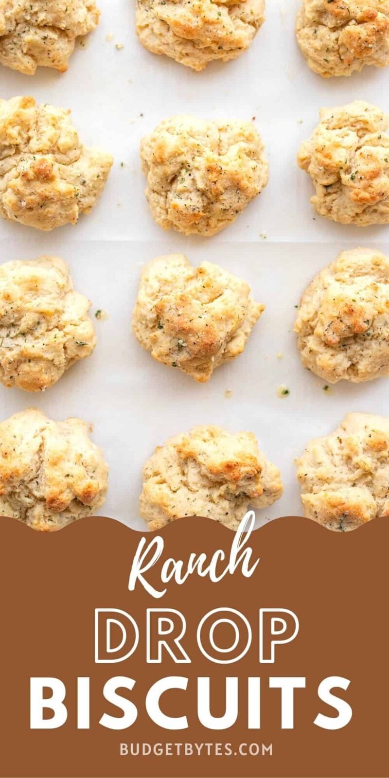 overhead view of ranch drop biscuits on the baking sheet, title text at the bottom