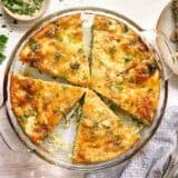 Overhead view of slices of crustless quiche in a dish.