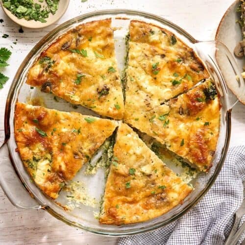 Overhead view of slices of crustless quiche in a dish.