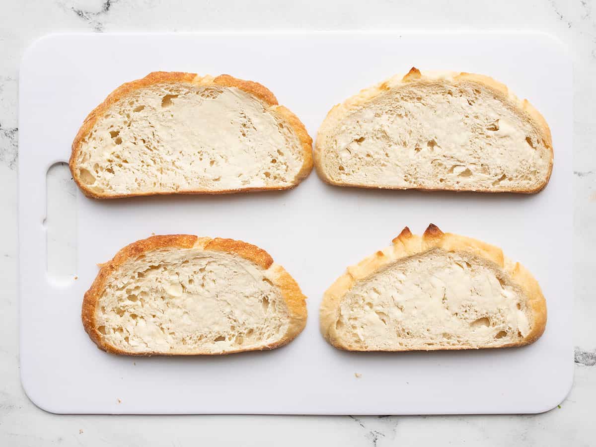 Four slices of buttered bread.