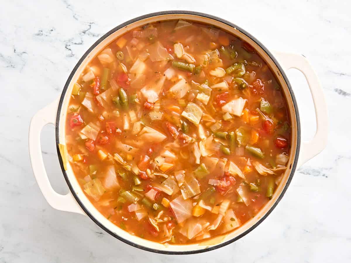 Finish cabbage soup after simmering.