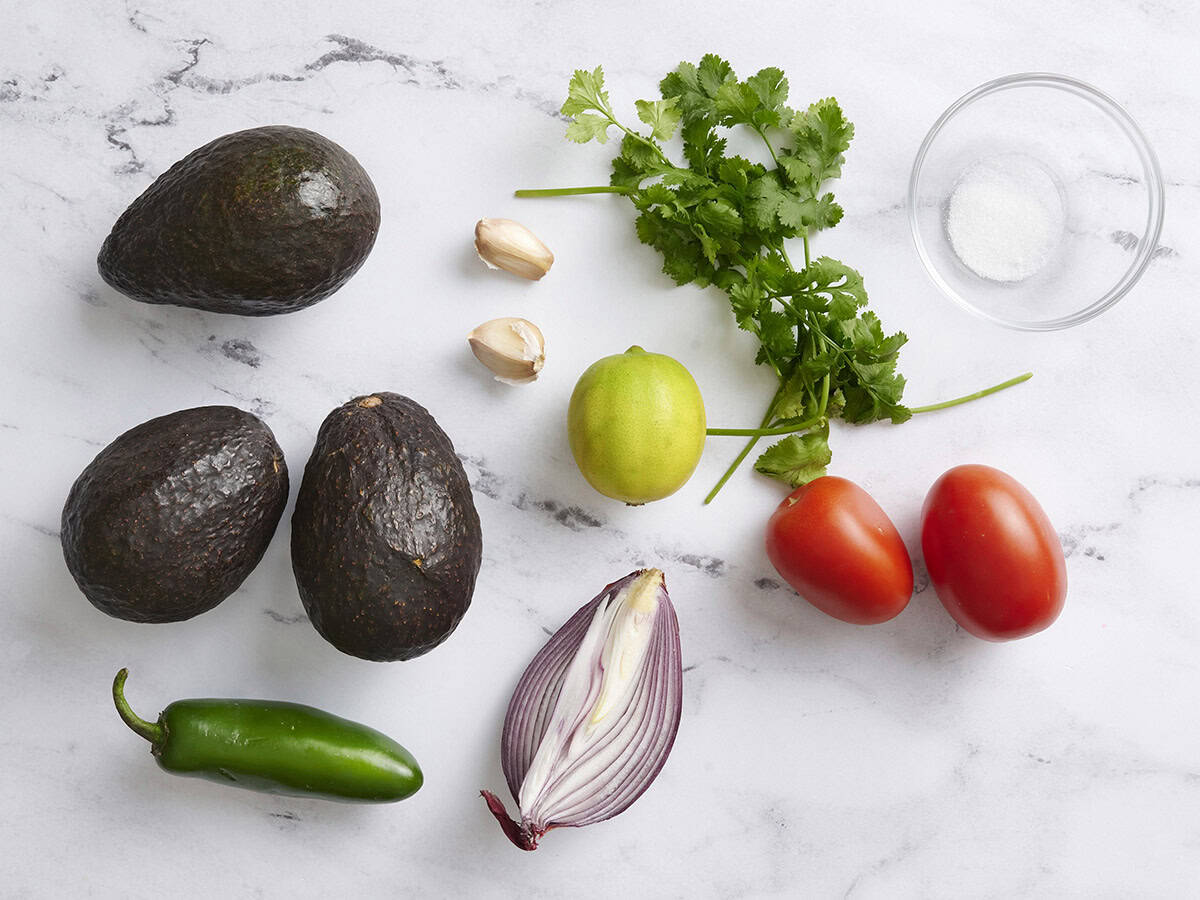 The ingredients to make homemade guacamole.