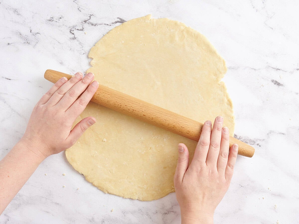 Pie dough being rolled out.