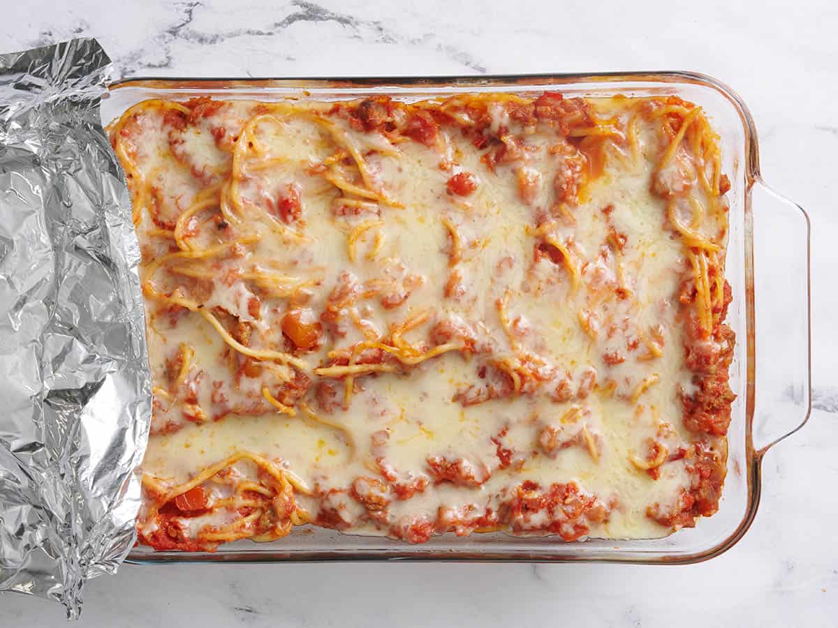 Finished baked spaghetti in a baking dish.