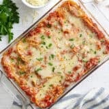 Overhead view of baked spaghetti in a baking dish.