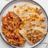 Plated quesadillas and Spanish rice.