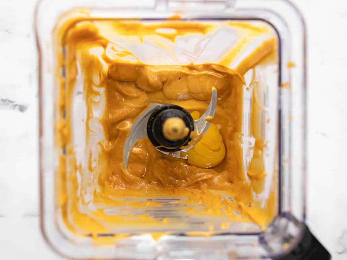 Eggs and vanilla added to the blender with pumpkin mixture.