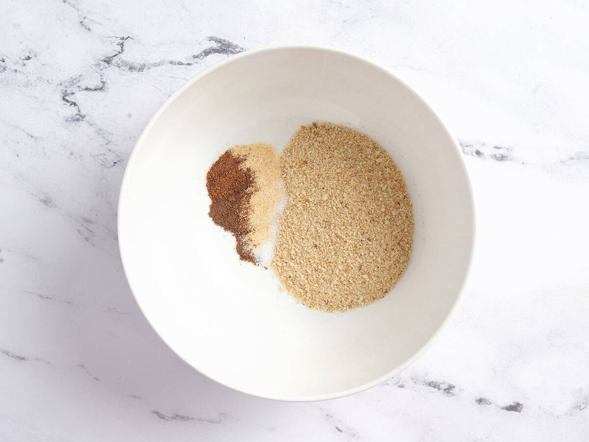 Seasonings and breadcrumbs in a bowl.