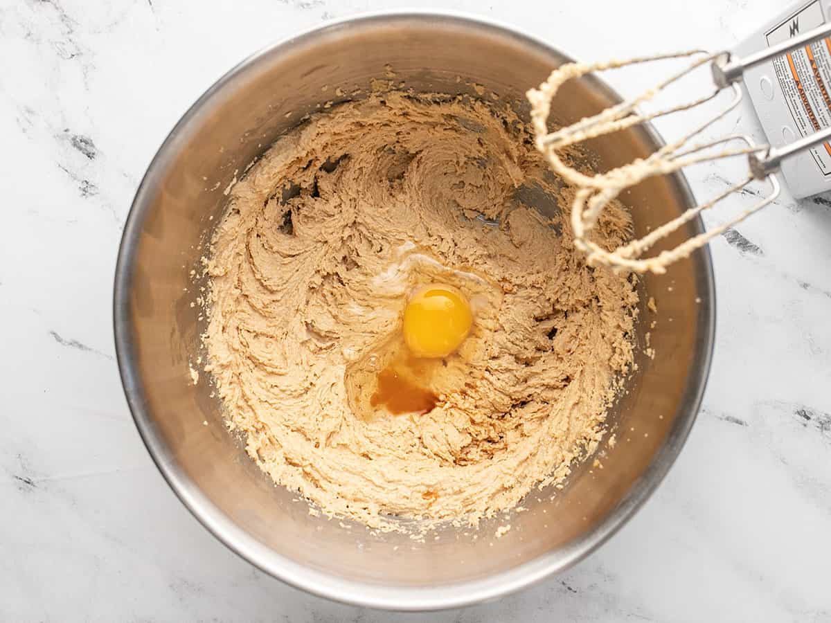 Egg and vanilla added to the butter and sugar.
