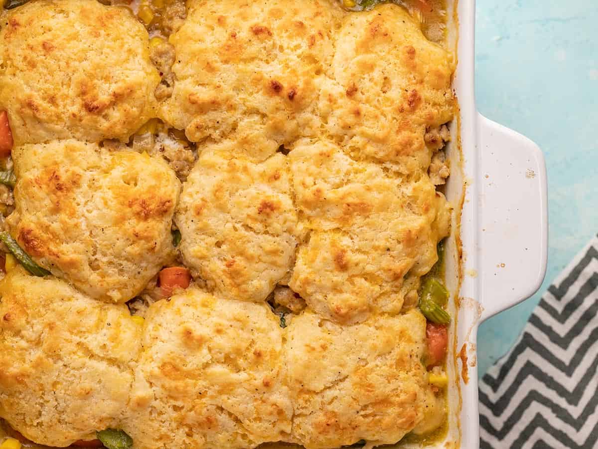 Close up image of baked chicken and biscuit casserole